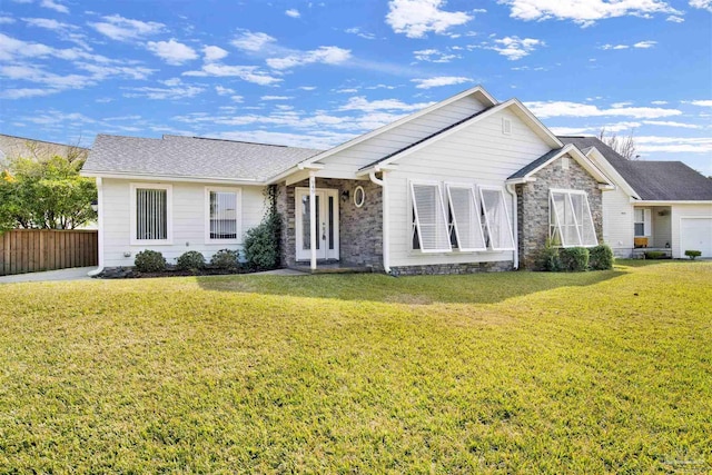 single story home with a front lawn