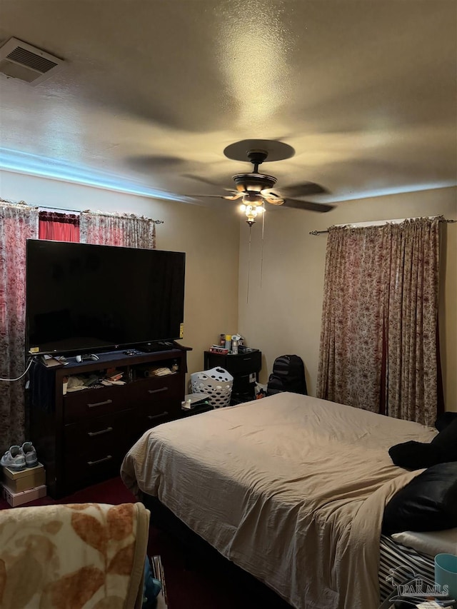 bedroom featuring ceiling fan