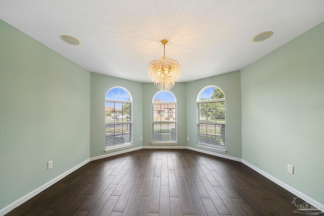 view of swimming pool featuring a patio area, ceiling fan, and glass enclosure