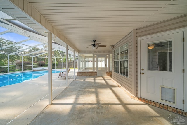 view of patio / terrace featuring a lanai and ceiling fan