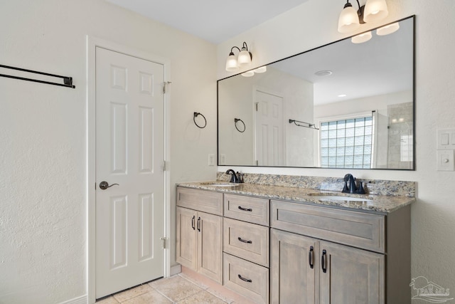 bathroom featuring vanity and tile patterned floors