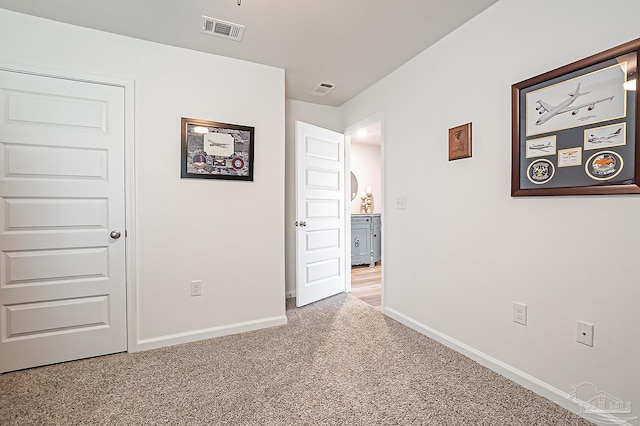 4366 White Cedar Ct, Pace, FL 32571 - unfurnished bedroom featuring baseboards, carpet, and arched walkways