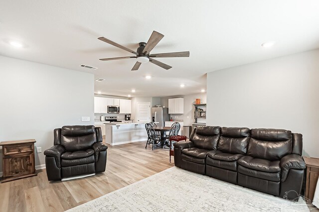 4366 White Cedar Ct, Pace, FL 32571 - living room with a ceiling fan, light wood-style flooring, and recessed lighting