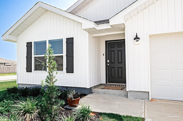 4366 White Cedar Ct, Pace, FL 32571 - view of exterior entry with a garage