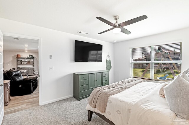 4366 White Cedar Ct, Pace, FL 32571 - bedroom featuring baseboards, light carpet, and a ceiling fan