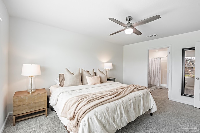 4366 White Cedar Ct, Pace, FL 32571 - bedroom with carpet, baseboards, a ceiling fan, and connected bathroom