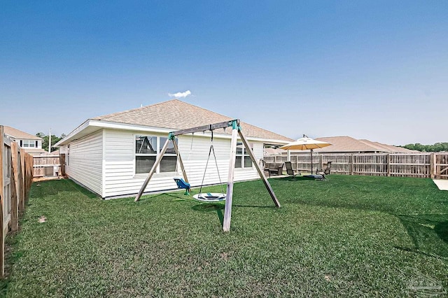 4366 White Cedar Ct, Pace, FL 32571 - rear view of property with a shingled roof