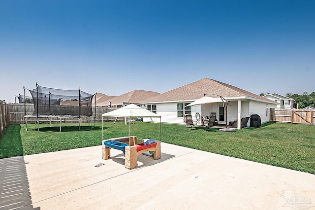 4366 White Cedar Ct, Pace, FL 32571 - view of patio / terrace featuring a trampoline