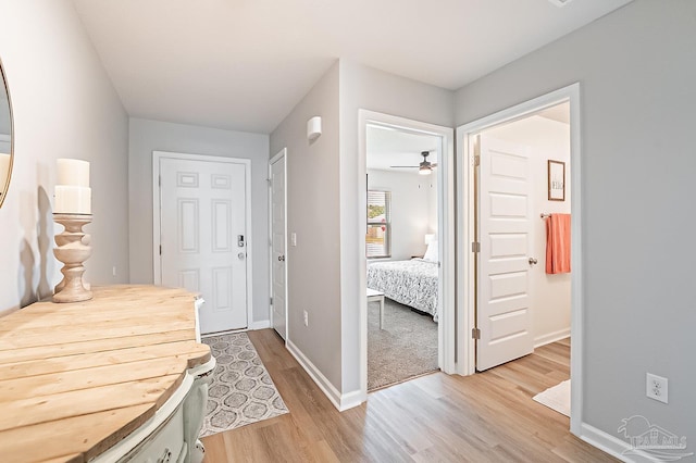 4366 White Cedar Ct, Pace, FL 32571 - foyer entrance featuring light wood finished floors, baseboards, and ceiling fan