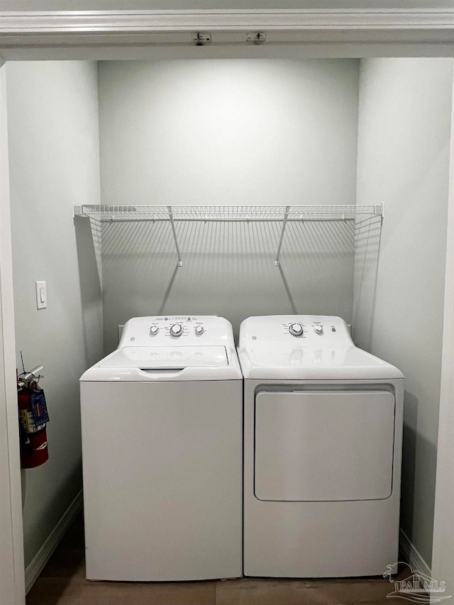 washroom featuring washer and dryer