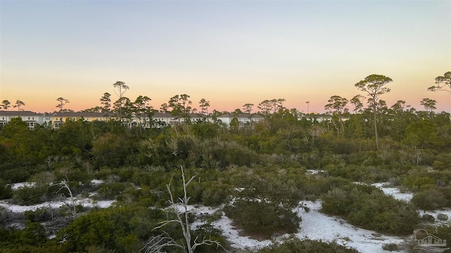 nature at dusk featuring a water view