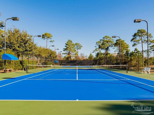 view of sport court featuring basketball hoop