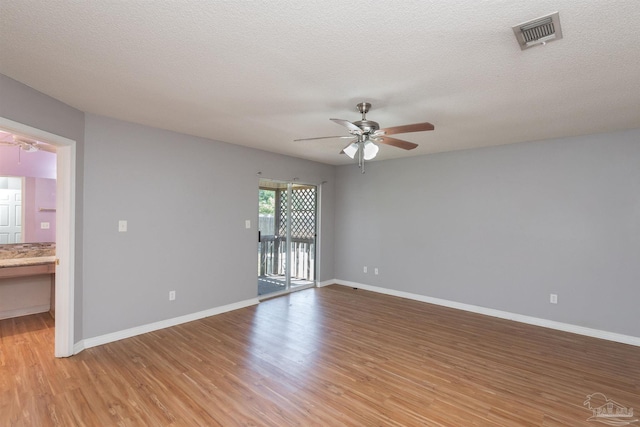 308 Twisted Oak Dr, Cantonment, FL 32533 - spare room featuring visible vents, ceiling fan, light wood finished floors, and baseboards