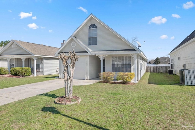 view of front of property with central AC unit, a garage, fence, driveway, and a front lawn