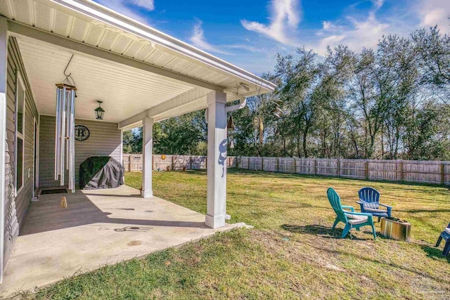 view of yard featuring a patio area and fence