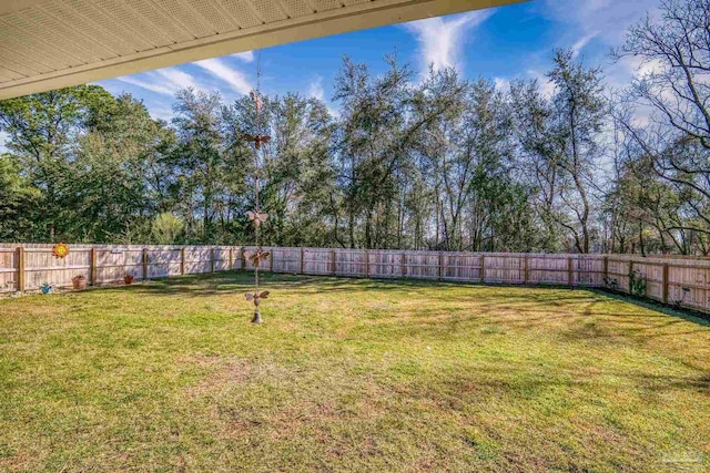 view of yard featuring a fenced backyard