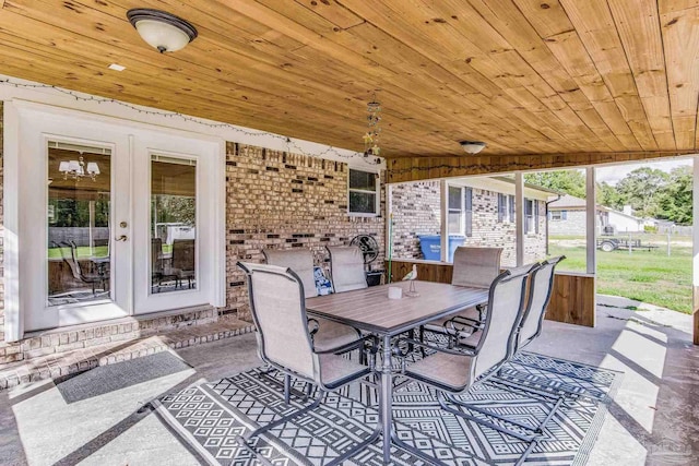 view of patio / terrace with outdoor dining space and french doors