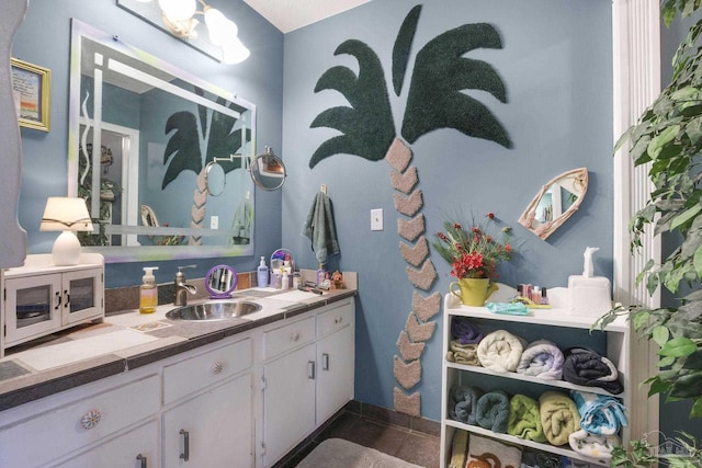 bathroom with vanity and tile patterned floors