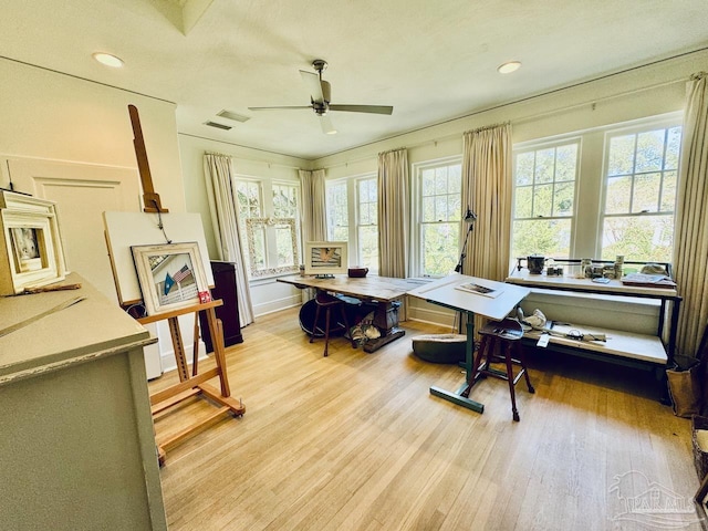 interior space featuring ceiling fan and light wood-type flooring