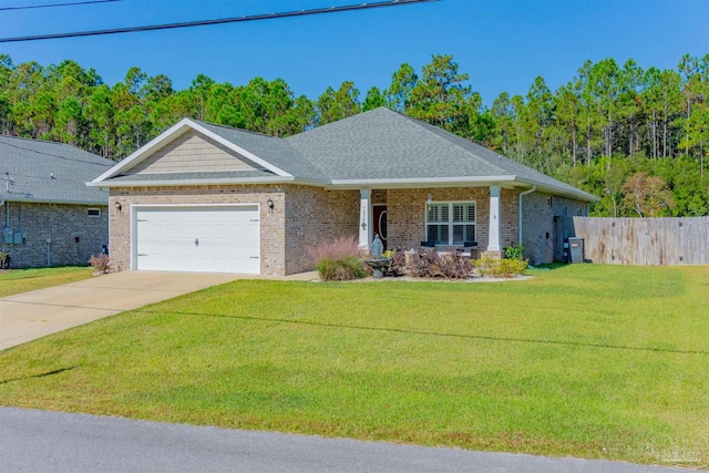 ranch-style house featuring a garage and a front lawn