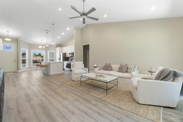 2098 Anna Ct, Milton, FL 32583 - living room featuring light wood-style floors, a ceiling fan, high vaulted ceiling, recessed lighting, and baseboards