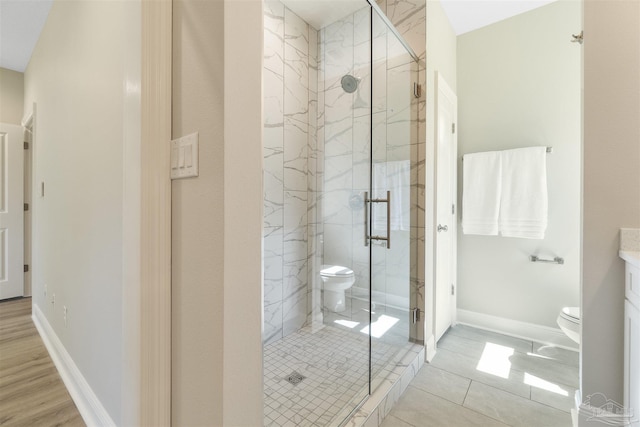 2098 Anna Ct, Milton, FL 32583 - full bathroom with toilet, a marble finish shower, vanity, and baseboards