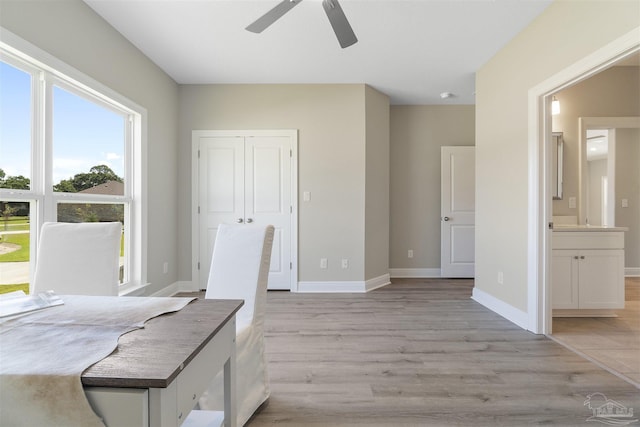 2098 Anna Ct, Milton, FL 32583 - office area featuring ceiling fan, light wood finished floors, and baseboards