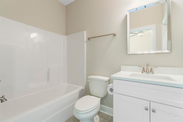 full bathroom featuring vanity, tile patterned flooring, toilet, ceiling fan, and tub / shower combination