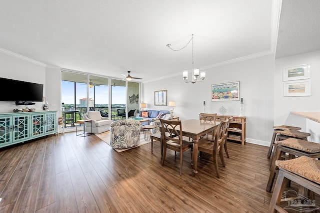612 Lost Key Dr Unit 702-B, Pensacola, FL 32507 - dining space featuring dark wood-style flooring, floor to ceiling windows, ornamental molding, a ceiling fan, and a chandelier