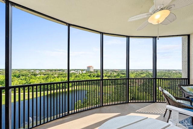 612 Lost Key Dr Unit 702-B, Pensacola, FL 32507 - sunroom featuring a ceiling fan and a water view