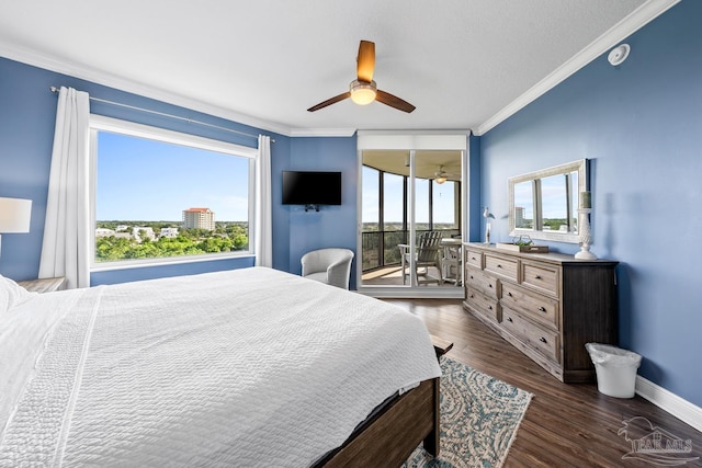 612 Lost Key Dr Unit 702-B, Pensacola, FL 32507 - bedroom with crown molding, multiple windows, dark wood finished floors, a ceiling fan, and baseboards