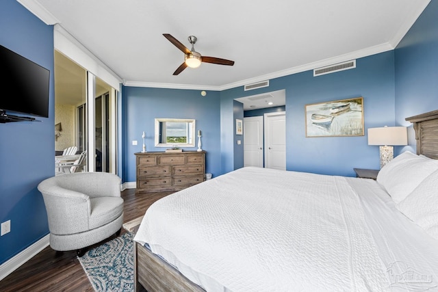 612 Lost Key Dr Unit 702-B, Pensacola, FL 32507 - bedroom featuring dark wood-style flooring, crown molding, baseboards, a ceiling fan, and a closet