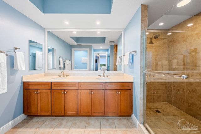 612 Lost Key Dr Unit 702-B, Pensacola, FL 32507 - full bathroom featuring a shower stall, baseboards, double vanity, and recessed lighting