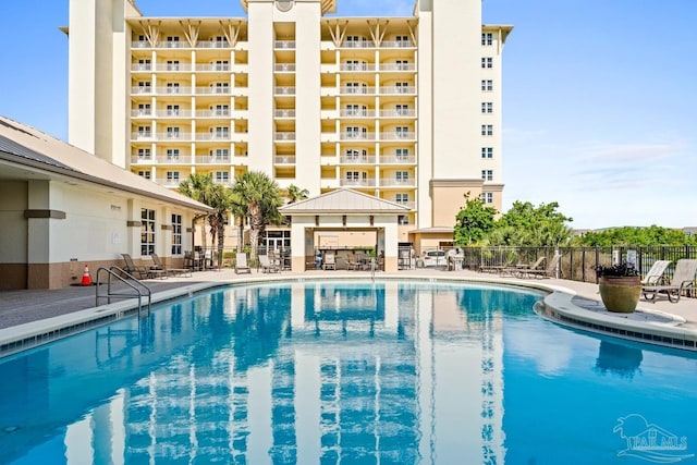 612 Lost Key Dr Unit 702-B, Pensacola, FL 32507 - community pool featuring a patio area