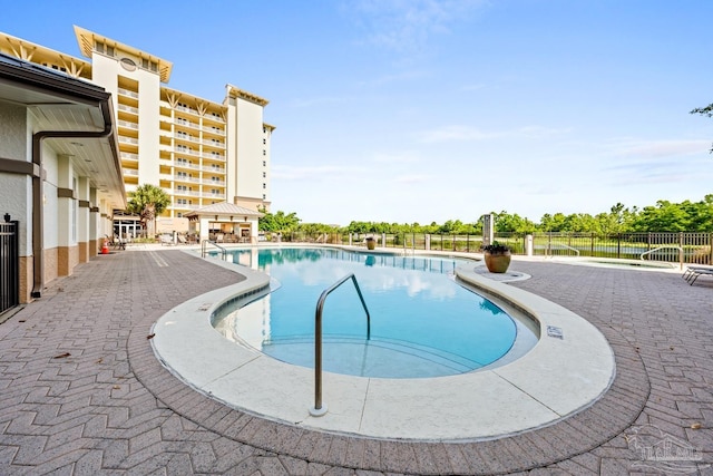 612 Lost Key Dr Unit 702-B, Pensacola, FL 32507 - community pool with a patio area