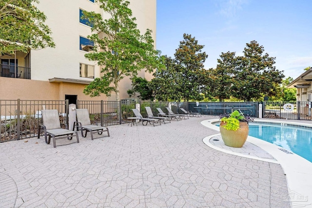 612 Lost Key Dr Unit 702-B, Pensacola, FL 32507 - community pool with a patio