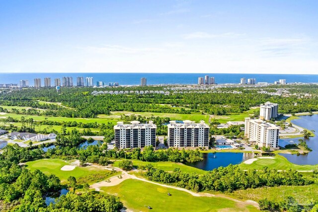 612 Lost Key Dr Unit 702-B, Pensacola, FL 32507 - view of urban area with a golf club, a nearby body of water, apartment complex / building, and a tree filled landscape