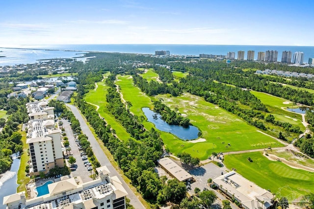 612 Lost Key Dr Unit 702-B, Pensacola, FL 32507 - drone / aerial view of a large body of water, a local golf course, apartment complex, and a tree filled landscape