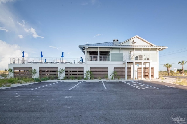 612 Lost Key Dr Unit 702-B, Pensacola, FL 32507 - view of property featuring uncovered parking