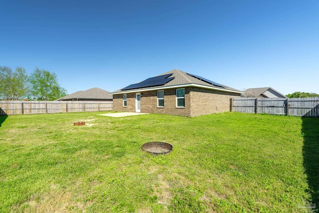 view of yard with a patio area and a fenced backyard
