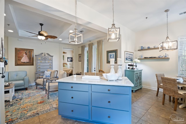 1430 Regency Rd Unit H103, Gulf Shores, AL 36542 - kitchen with blue cabinets, a ceiling fan, open floor plan, light countertops, and recessed lighting