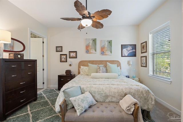 1430 Regency Rd Unit H103, Gulf Shores, AL 36542 - bedroom featuring dark carpet and a ceiling fan
