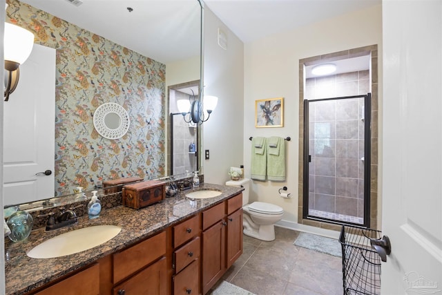 1430 Regency Rd Unit H103, Gulf Shores, AL 36542 - full bath with a shower stall, double vanity, tile patterned floors, and wallpapered walls
