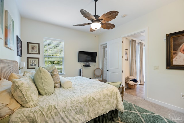 1430 Regency Rd Unit H103, Gulf Shores, AL 36542 - carpeted bedroom with baseboards and ceiling fan