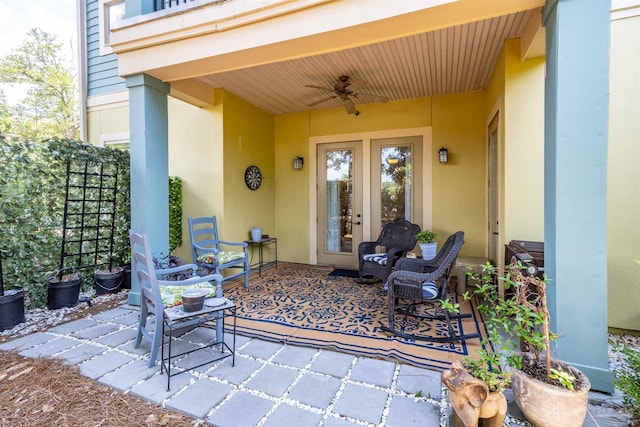 1430 Regency Rd Unit H103, Gulf Shores, AL 36542 - view of patio featuring ceiling fan and french doors