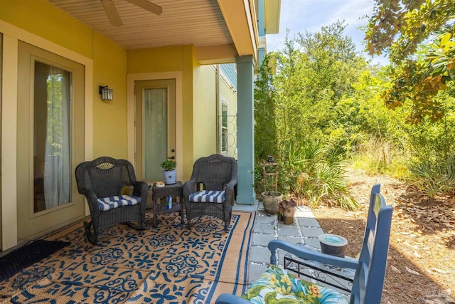 1430 Regency Rd Unit H103, Gulf Shores, AL 36542 - view of patio with a ceiling fan