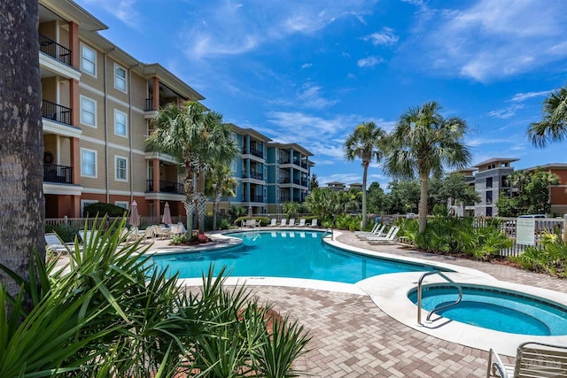 1430 Regency Rd Unit H103, Gulf Shores, AL 36542 - community pool with a community hot tub and a patio