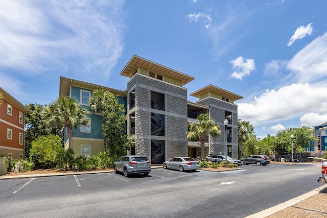1430 Regency Rd Unit H103, Gulf Shores, AL 36542 - view of property with uncovered parking