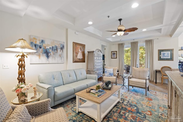 1430 Regency Rd Unit H103, Gulf Shores, AL 36542 - tiled living room with a ceiling fan, recessed lighting, and a tray ceiling