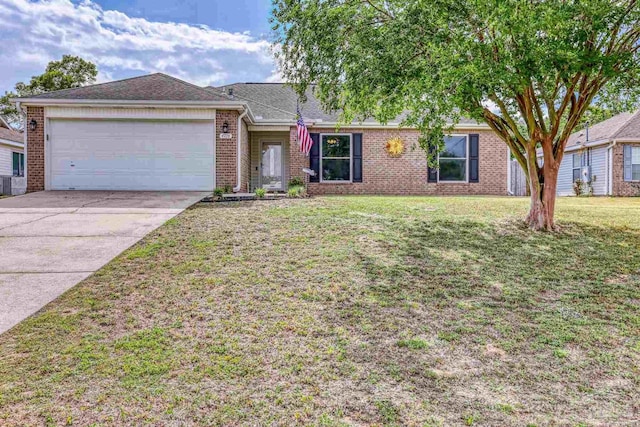 ranch-style home with a garage, a front lawn, brick siding, and driveway